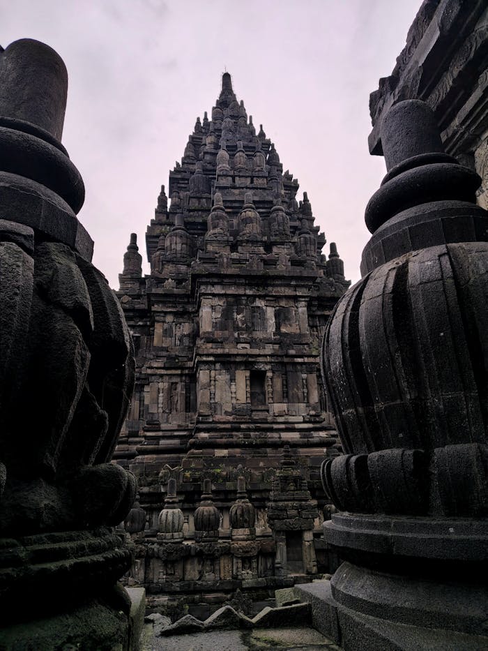 Dramatic view of Prambanan Temple showcasing exquisite ancient architecture at dusk.